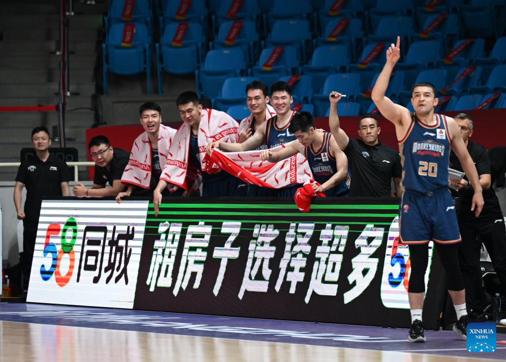 Shenyang. 15th Mar, 2022. Xiralijan Muhtar (R) of Nanjing Monkey Kings goes  for a basket during the 35th round match between Jiangsu Dragons and Nanjing  Monkey Kings at the 2021-2022 season of