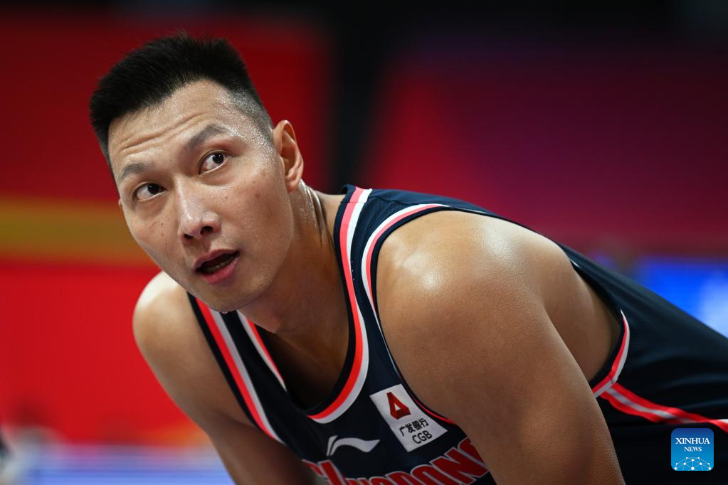 Shenyang. 6th Mar, 2022. Zhao Boqing (L) of Nanjing Monkey Kings competes  during the 31st round match between Nanjing Monkey Kings and Jiangsu  Dragons at the 2021-2022 season of the Chinese Basketball
