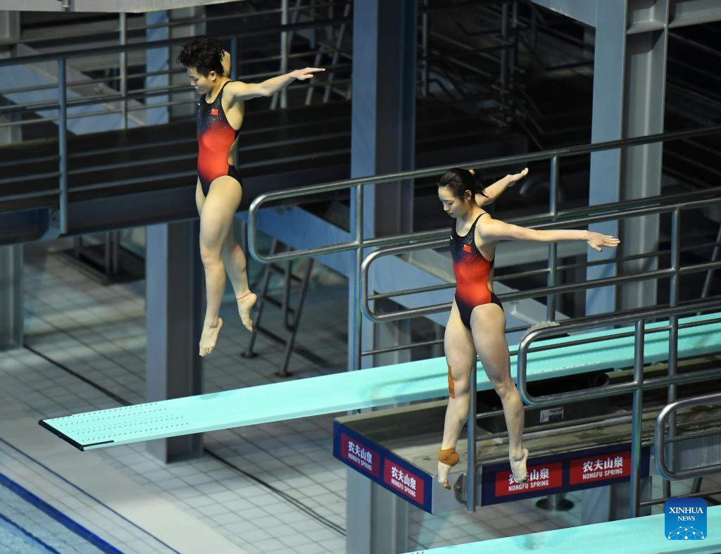 In pics women's synchronized 3m springboard final at FINA Diving World