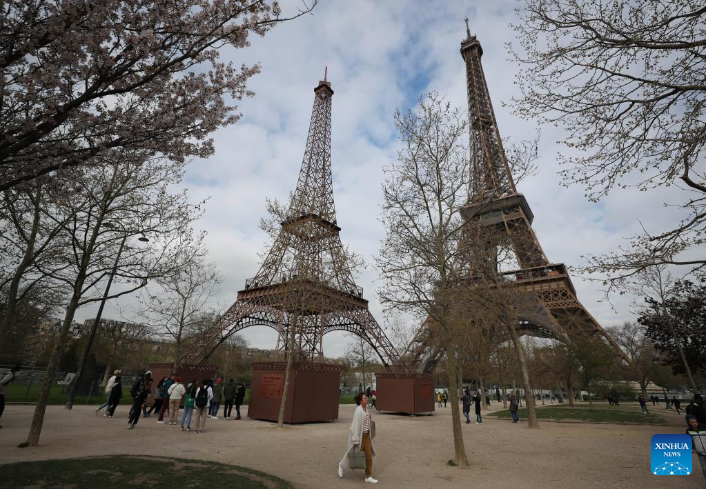 In pics: Eiffel Tower and its replica in Paris, France-Xinhua