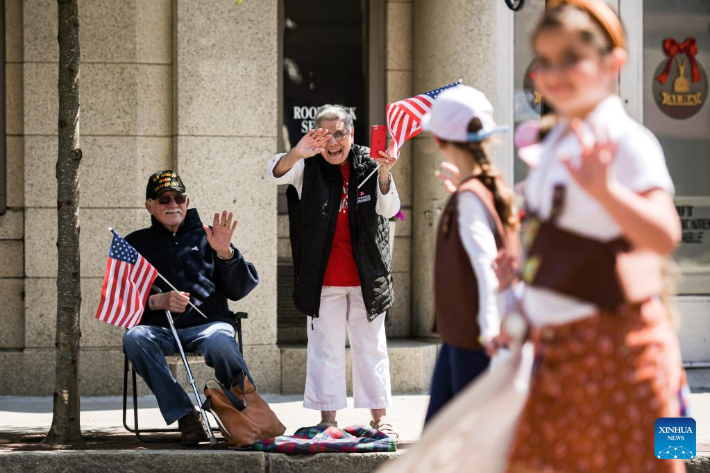 People take part in Memorial Day parade in Quincy, U.S. Xinhua