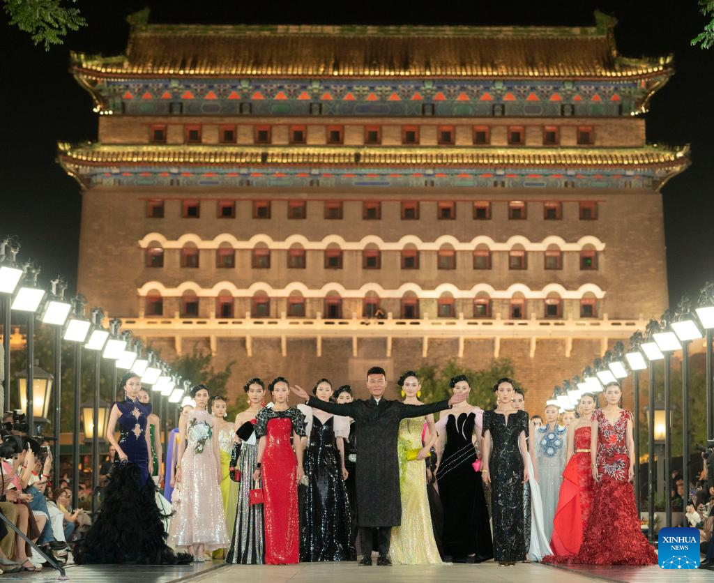 Beijing, China. 16th May, 2018. Models present creations designed
