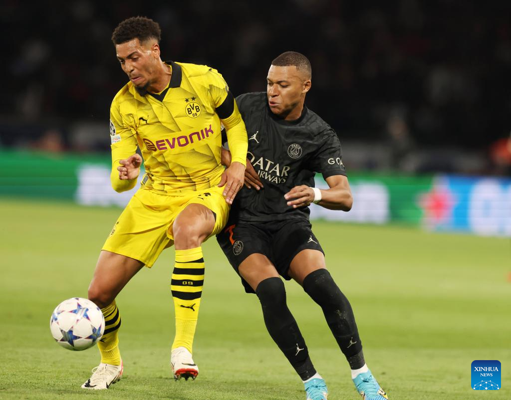 Dortmund fall to Ajax, Leipzig hold PSG in UEFA Champions League - Xinhua