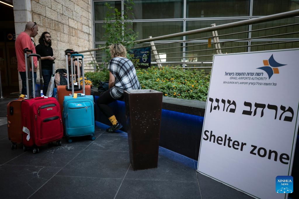 Passengers stranded at Ben Gurion Int'l Airport near Tel Aviv, Israel-Xinhua