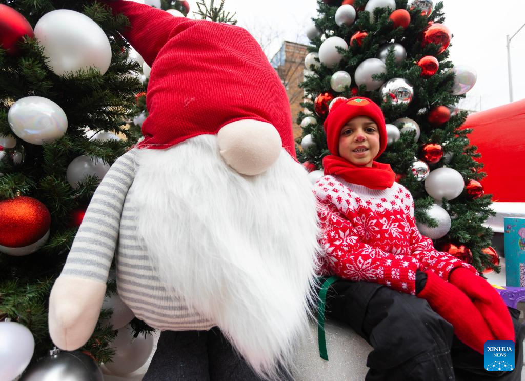 Highlights of 2024 Toronto Santa Claus ParadeXinhua