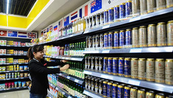 New tax rules on overseas buying to benefit Chinese retailers: Fitch