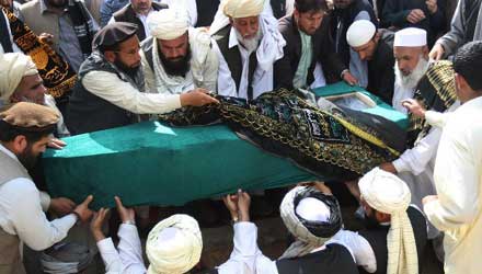 Afghan people hold funeral for peace negotiator