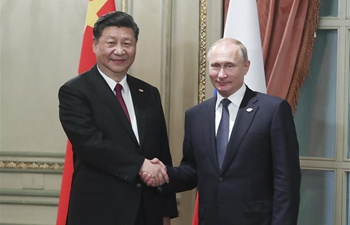 Xi, Putin meet on G20 sidelines