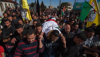 Palestinians hold funeral for teenager shot dead by Israeli forces