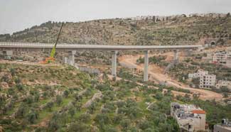 New section of Israel's separation concrete barrier placed near Bethlehem