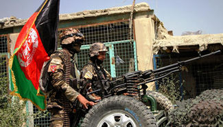 Afghan security force members take part in military operation