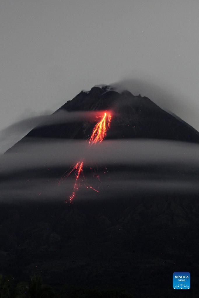 Mount Merapi spews smoke, volcanic materials in Magelang, Indonesia-Xinhua
