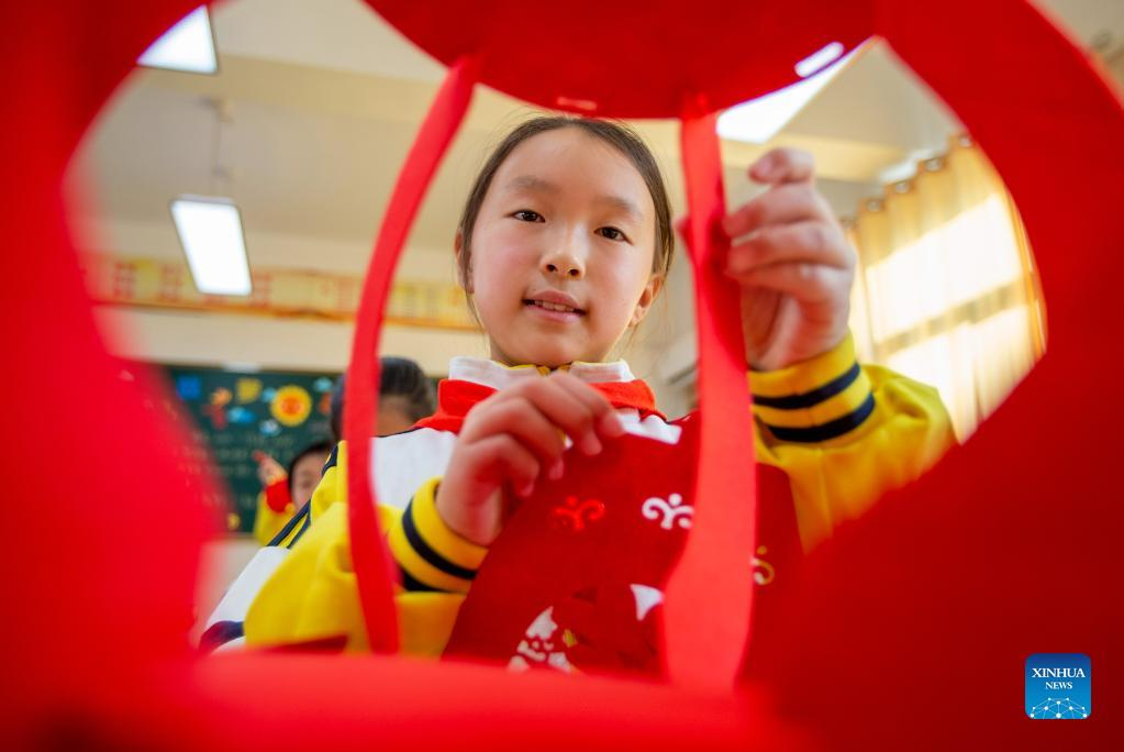 People across China organize activities to greet New Year-Xinhua
