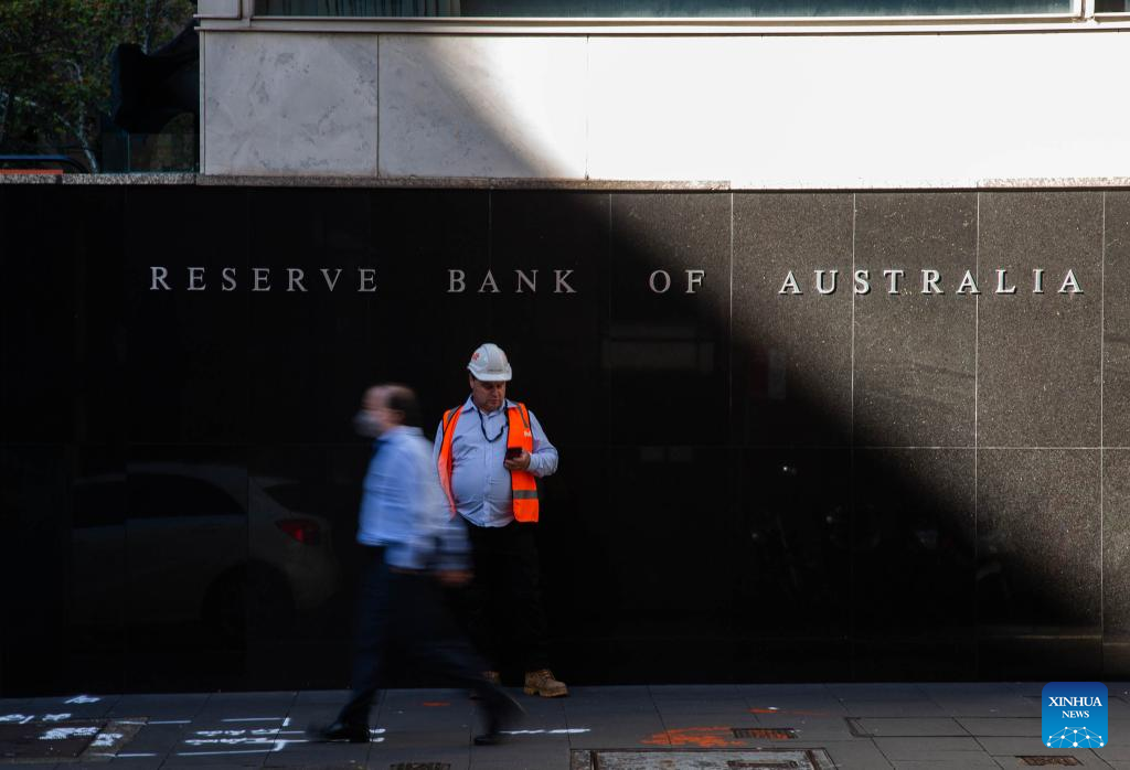 Australian central bank lifts interest rate for first time in over ...