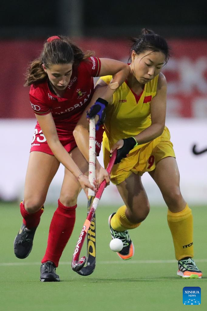 International Hockey Federation (FIH) - 1146173514 CHANGZHOU , CHINA - MAY  25: #16 Tiphaine Duquesne of Belgium battles for the ball during the  Women's FIH Field Hockey Pro League match between China