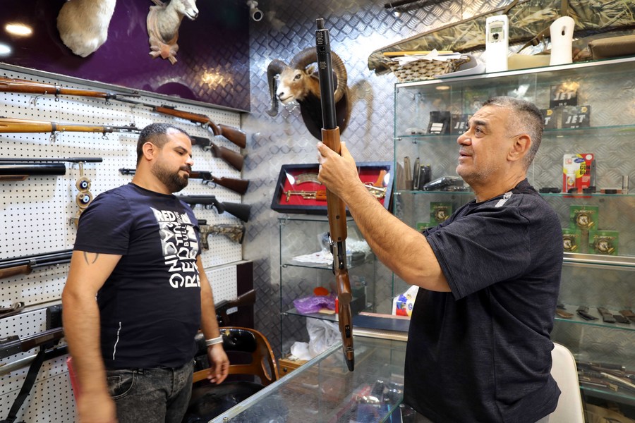 Mideast in Pictures: Arms market thrives with the arrival of Iraq's hunting season
