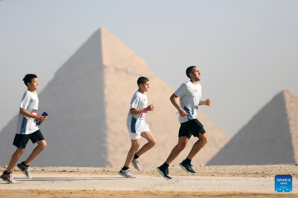 Feature Runners "race through history" at Egypt's Pyramids Half