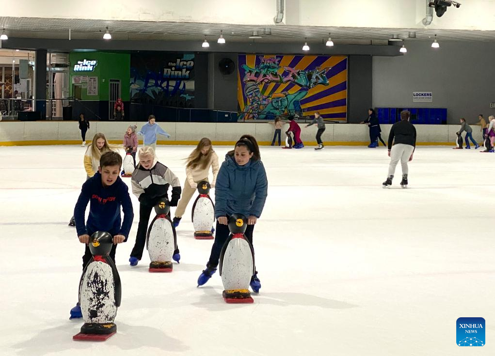 People skate at ice rink in Johannesburg, South AfricaXinhua