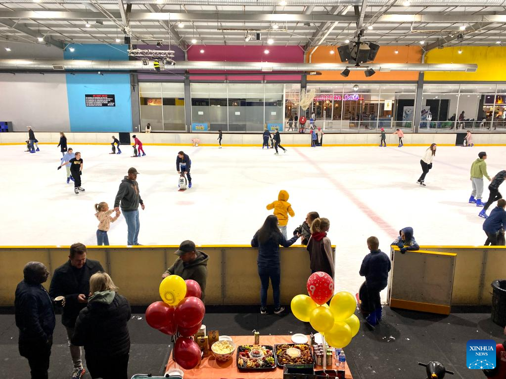 People skate at ice rink in Johannesburg, South AfricaXinhua