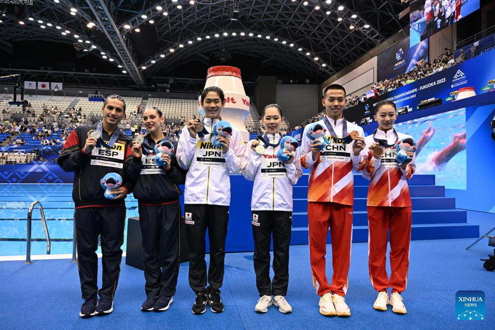 Japan's Sato siblings win mixed duet tech gold at swimming worlds-Xinhua