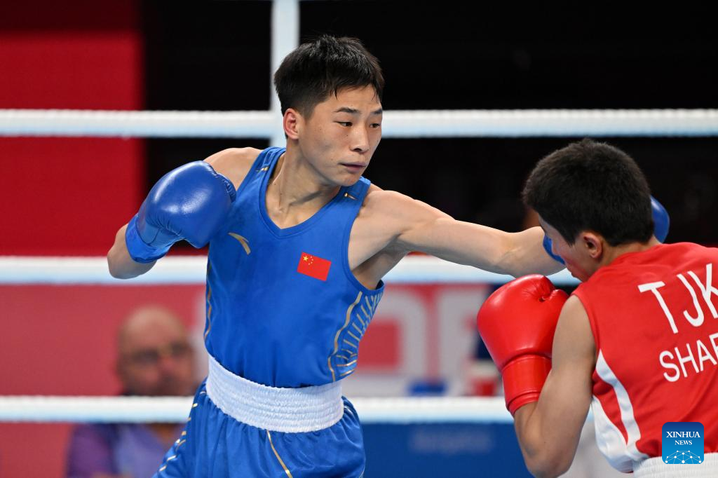 Chinese boxers march forwards on Day 2 at Hangzhou Asiad-Xinhua