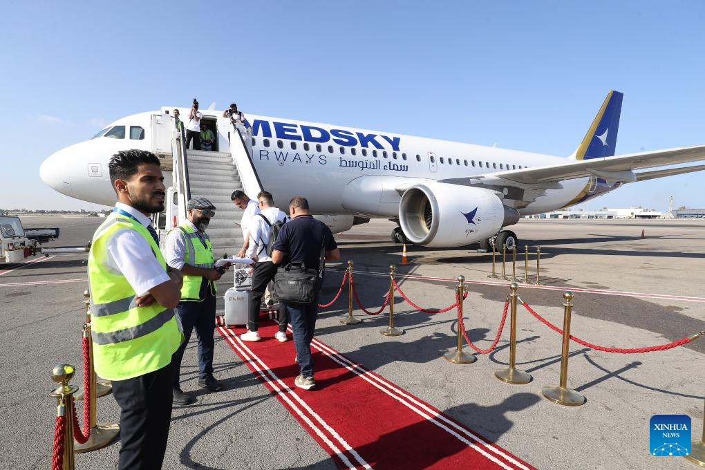 First commercial flight from Libya to Italy in almost 10 years