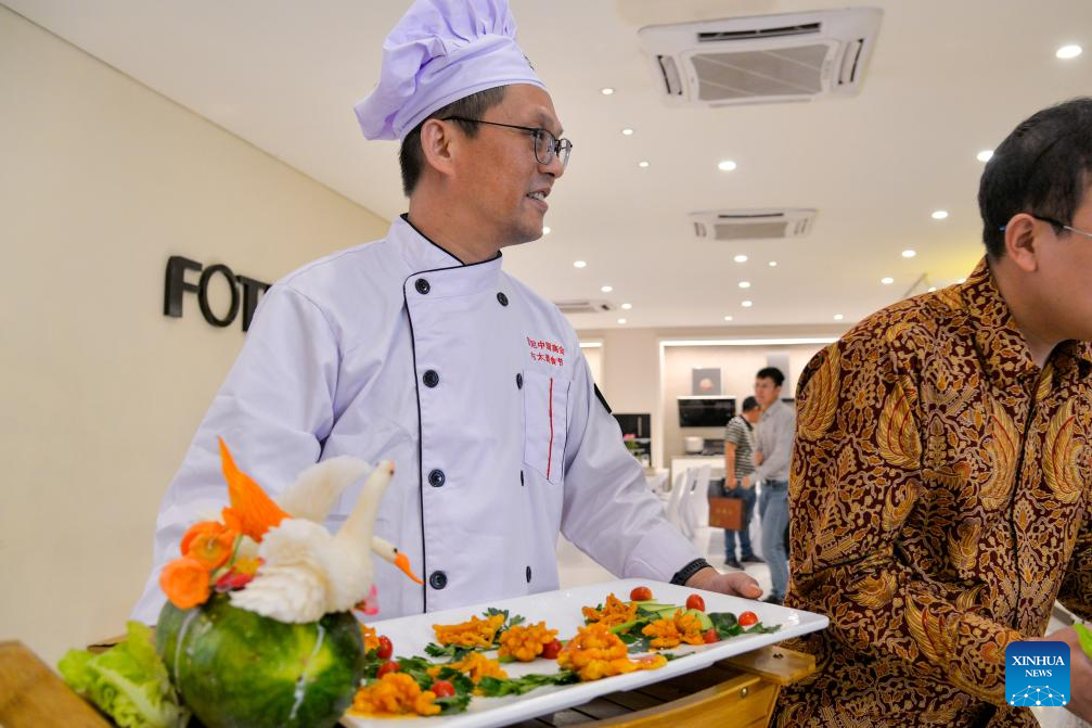 Cooks from Chinese language-funded firms attend a cooking competitors in Indonesia – Xinhua