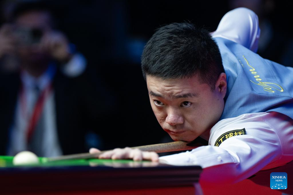 In pics exhibition game at 2023 Macau Snooker MastersXinhua