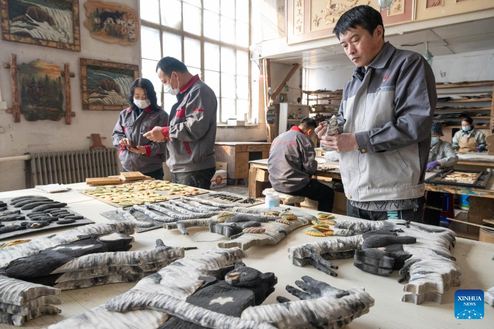 NE China's Yichun develops woodcraft industry to boost local economyXinhua