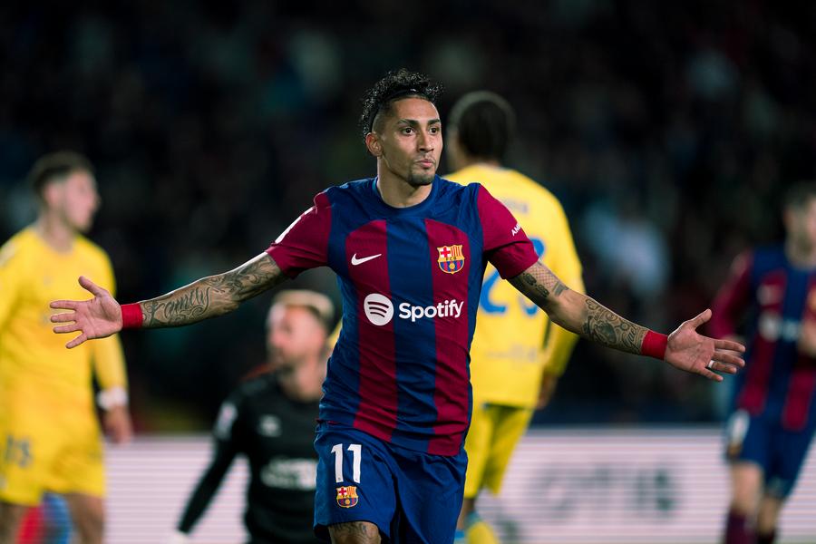 Barca close on Real Madrid, Sevilla edges GetafeXinhua