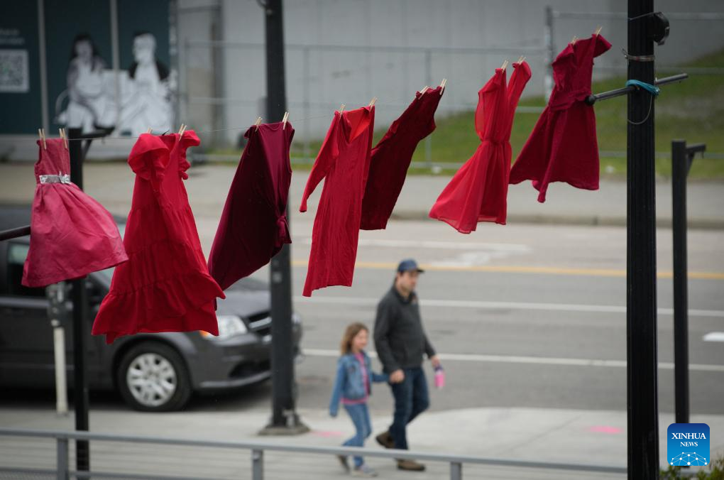 Red Dress Day celebrated in Canada – Xinhua