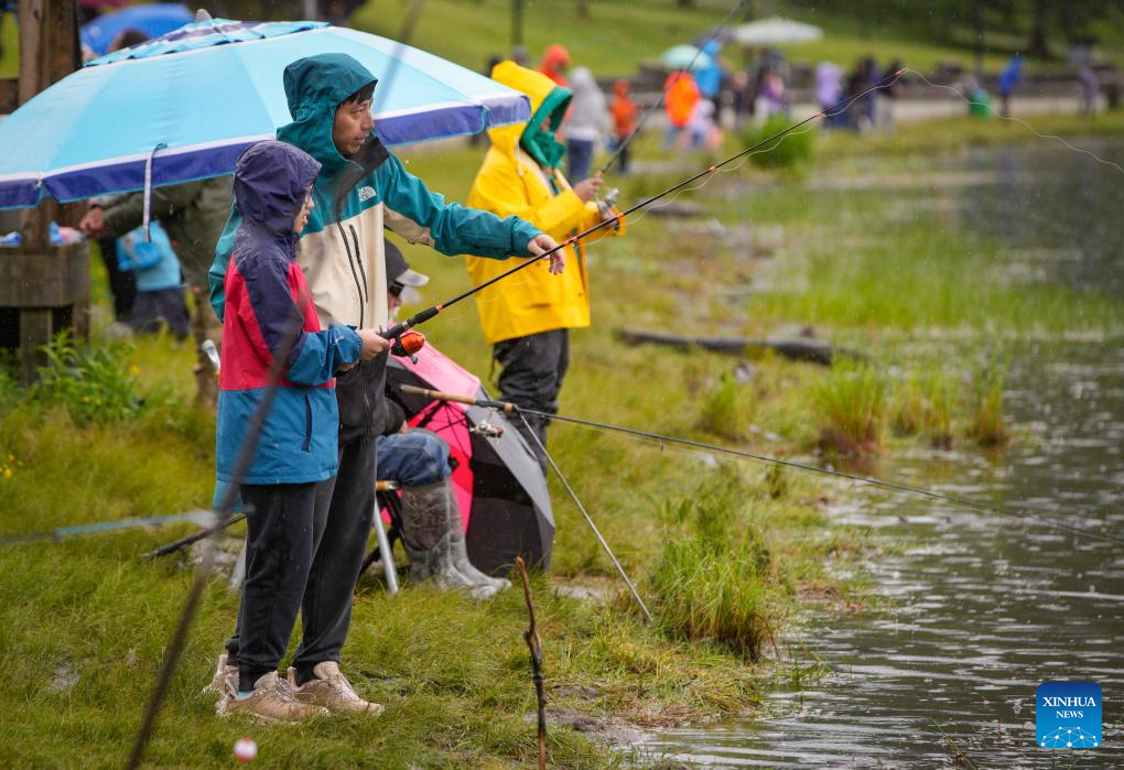 People participate in fishing event in CanadaXinhua