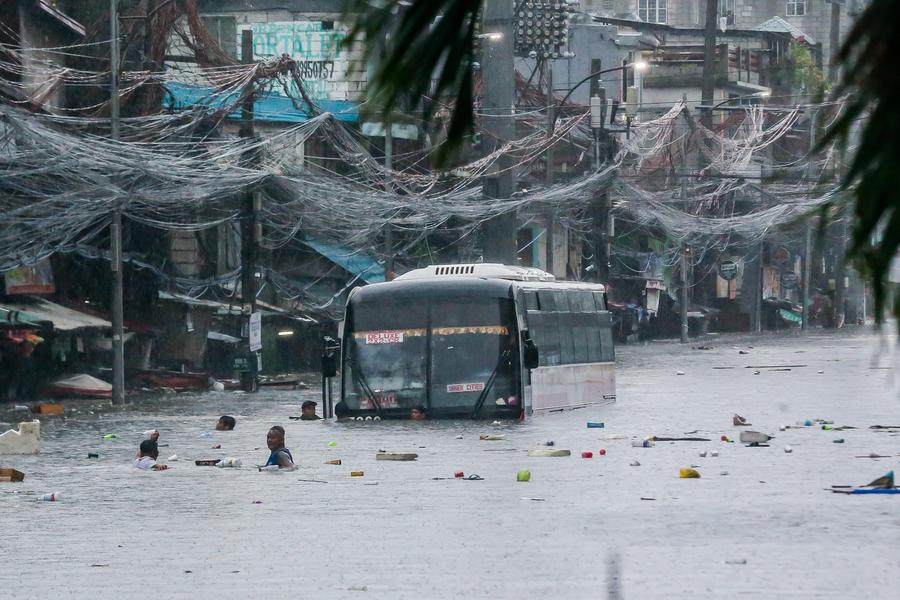 Typhoon buffets Philippines, killing at least 8-Xinhua