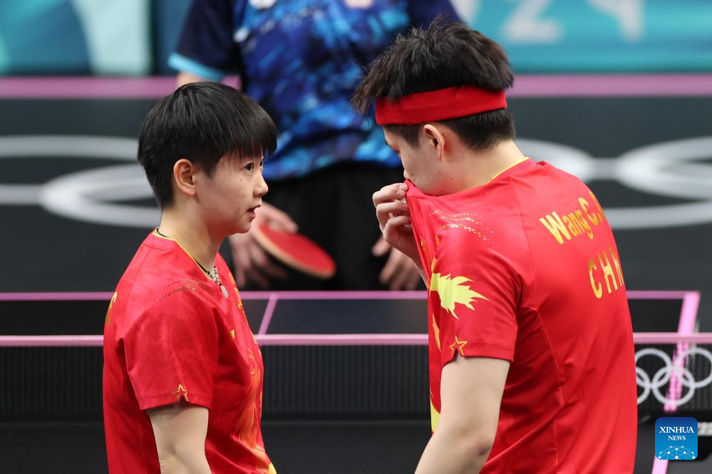 Olympics China's Wang/Sun to reach table tennis mixed doubles semis