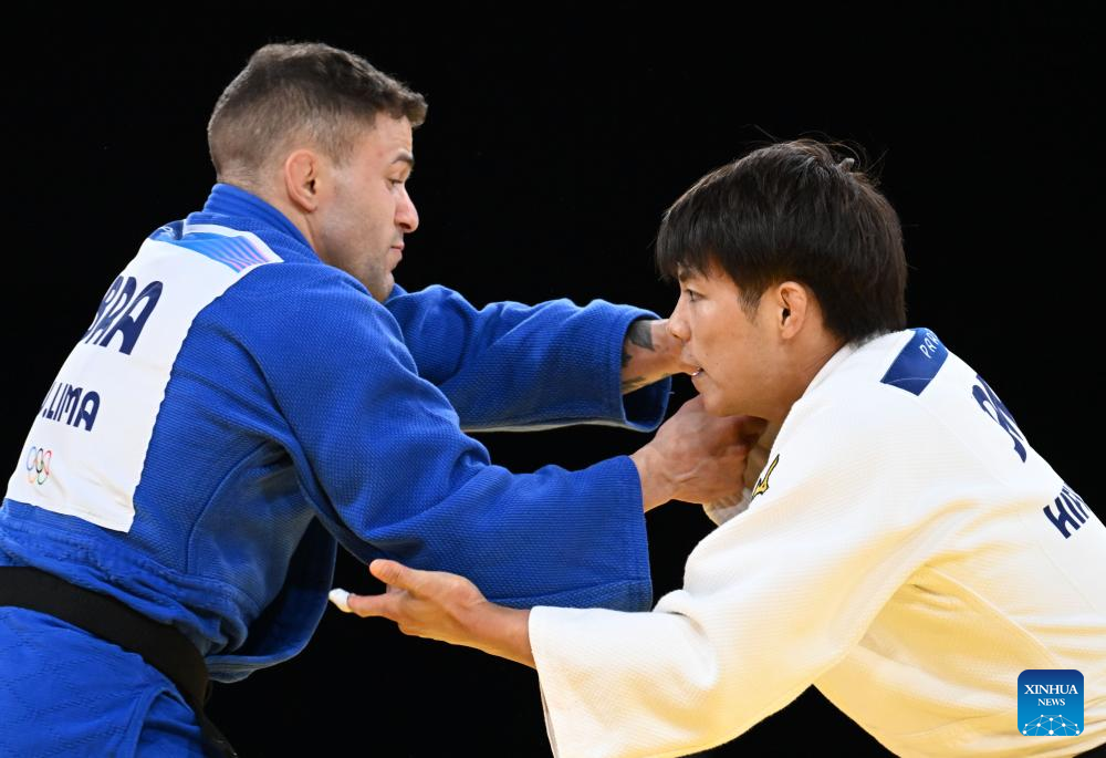 Olympics Japan's Abe retains men's judo 66kg title in ParisXinhua