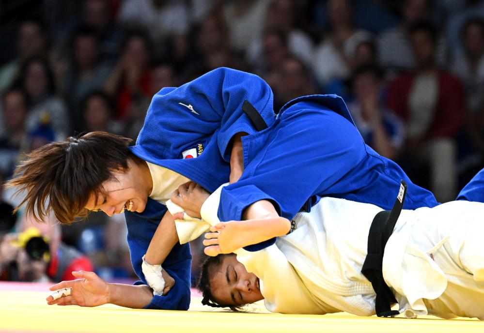 Olympics Japan's Abe retains men's judo 66kg title in Paris (updated