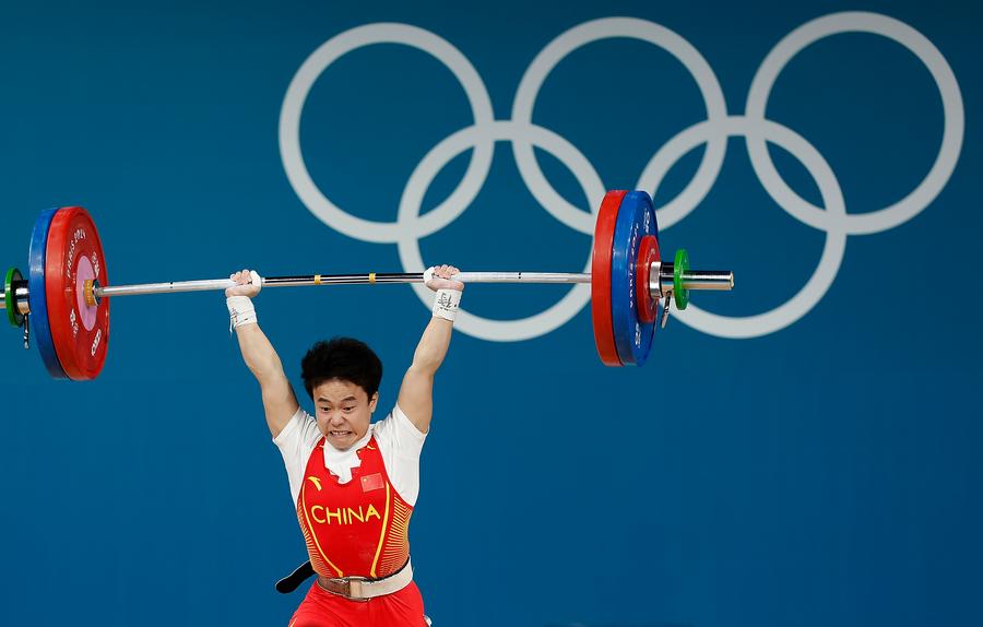 Olympics Chinese weightlifters Hou, Li retain gold at Paris 2024Xinhua