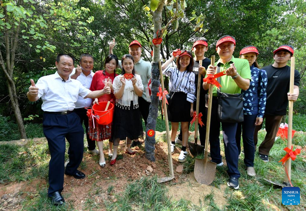 Couples Attend Tree-Planting Event on Qixi Festival in Xiamen