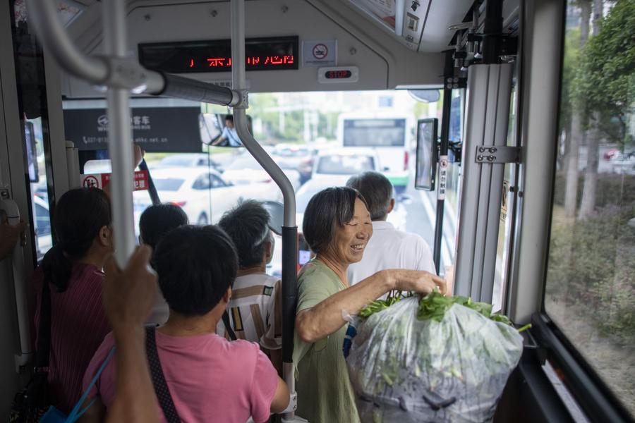 Dedicated bus route helps China's farmers sell fresh food in urban ...
