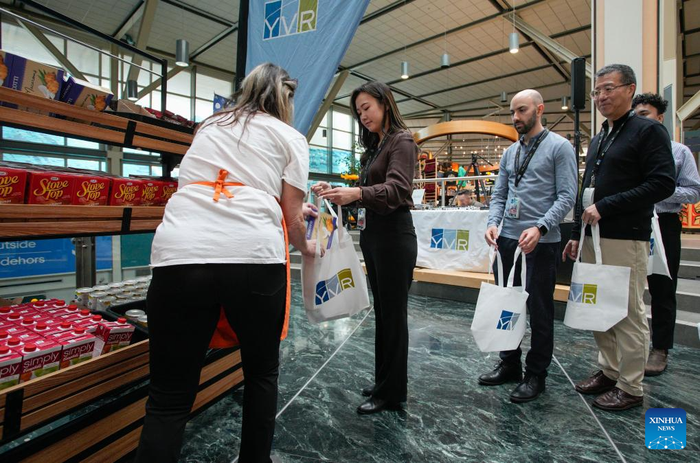 In pics: annual Holiday Hamper Drive event at Vancouver International ...