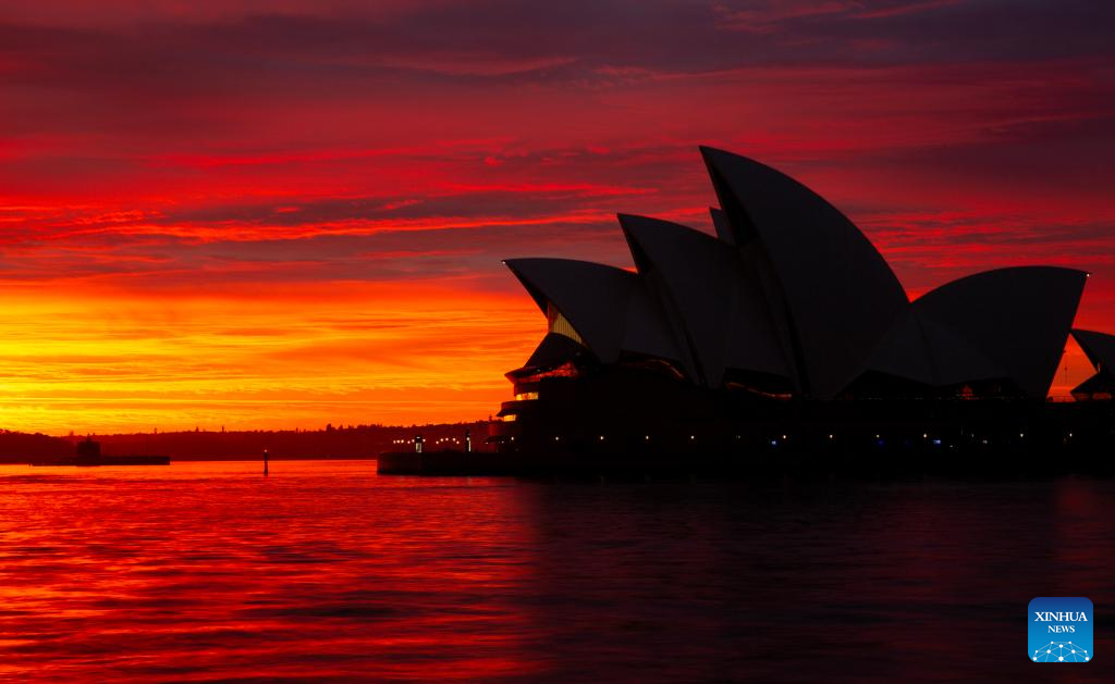 View of morning glow at Opera House in Sydney, Australia-Xinhua