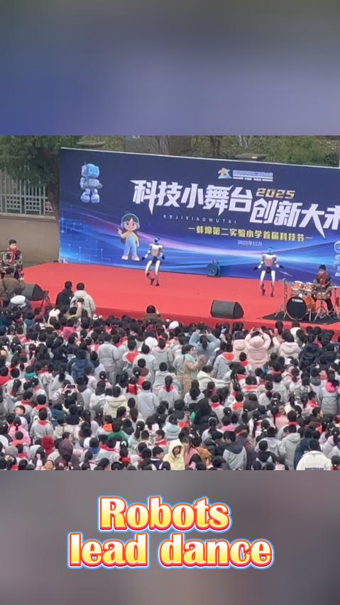Robots lead dance at E China school festival