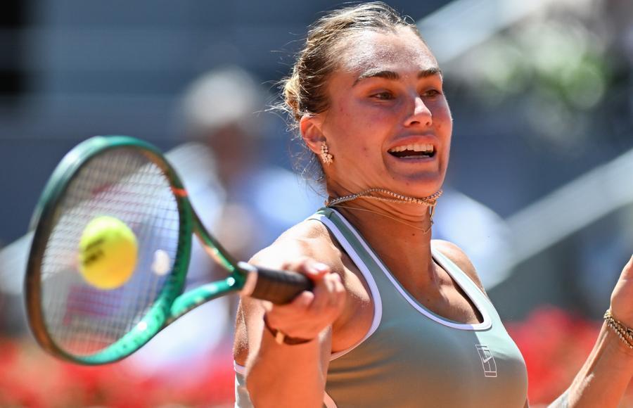 Aryna Sabalenka of Belarus hits a return during the women's singles round of 16 match against Osaka Naomi of Japan at the 2026 Madrid Open in Madrid, Spain, on April 27, 2026. (Xinhua/Cheng Min)