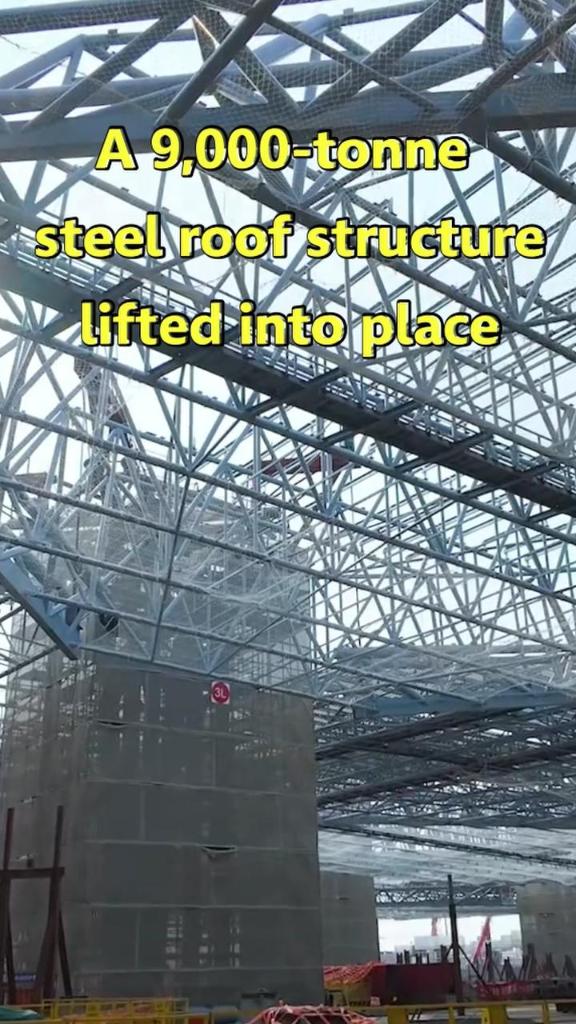 9,000-tonne steel roof structure lifted into place at Shanghai train station