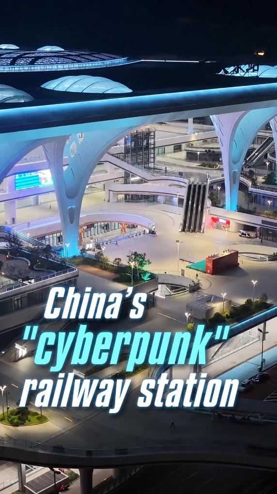 Night falls on China's cyberpunk railway station