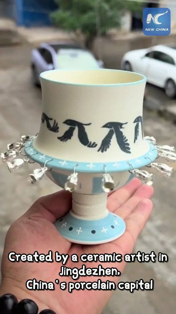 Ever seen birds fly on a porcelain cup?
