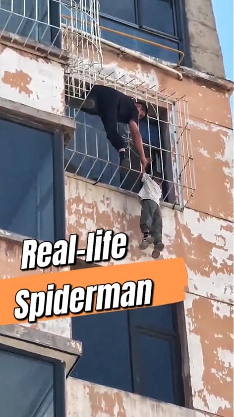 Real-life Spiderman: property manager saves boy from window guard