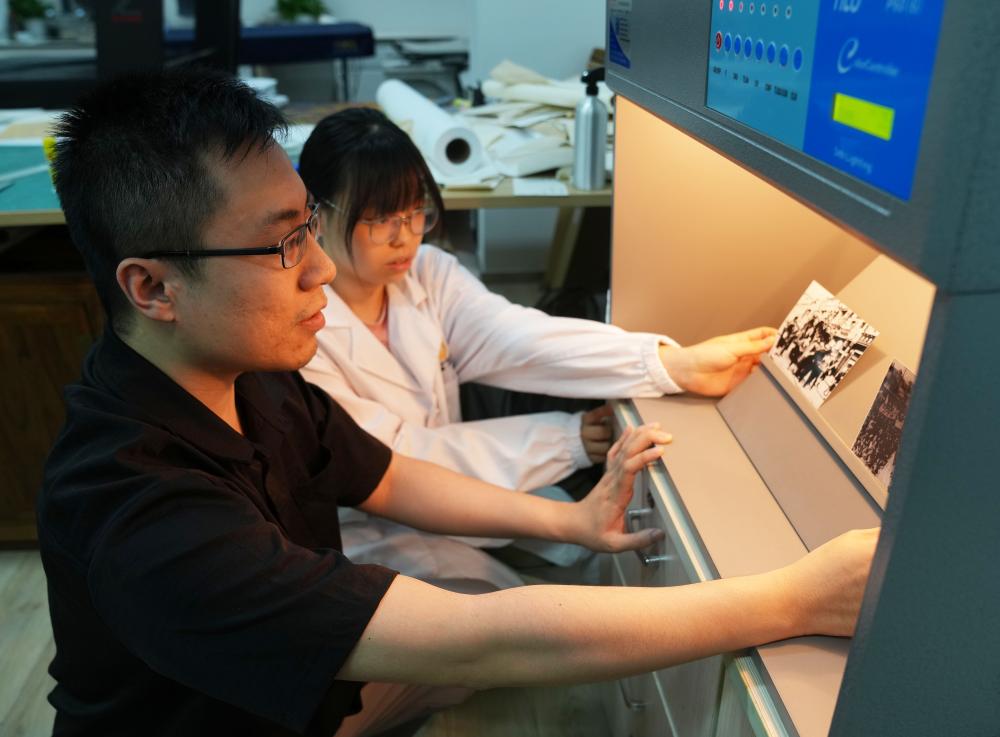 Archival professionals at Shanghai Archives dedicated to preserving ...