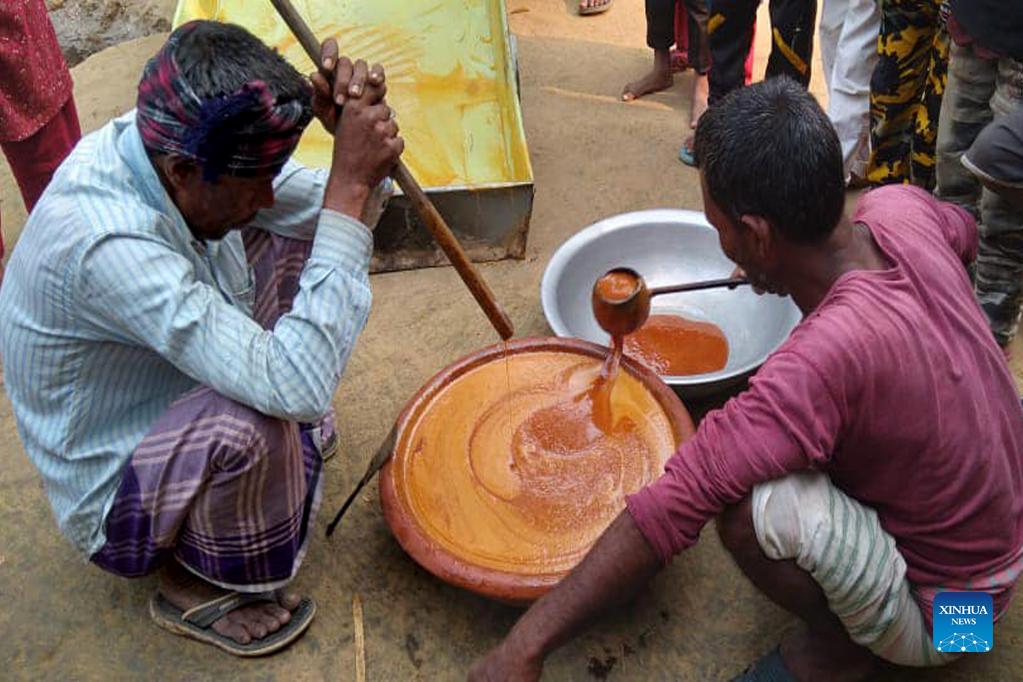 People make molasses in Magura, BangladeshXinhua