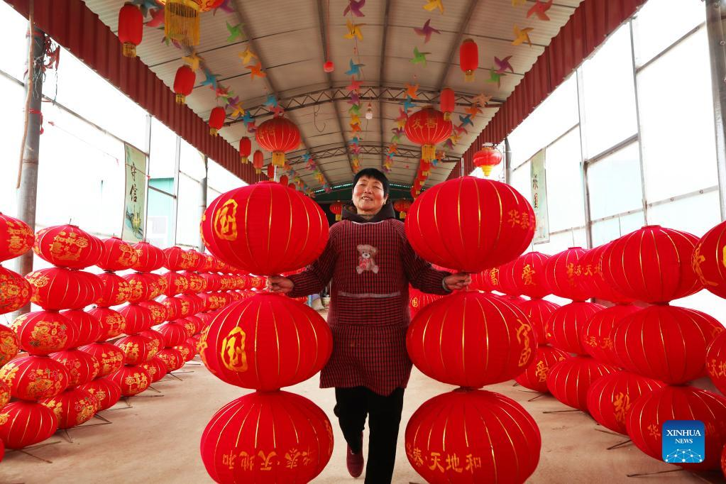 People across China organize activities to greet New Year-Xinhua
